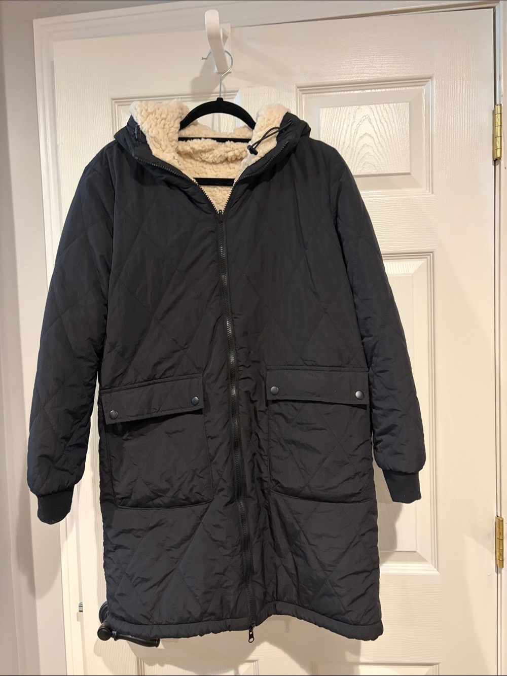Womens Long Quilted Hooded Coat with Sherpa Lining - Black reversible coat.